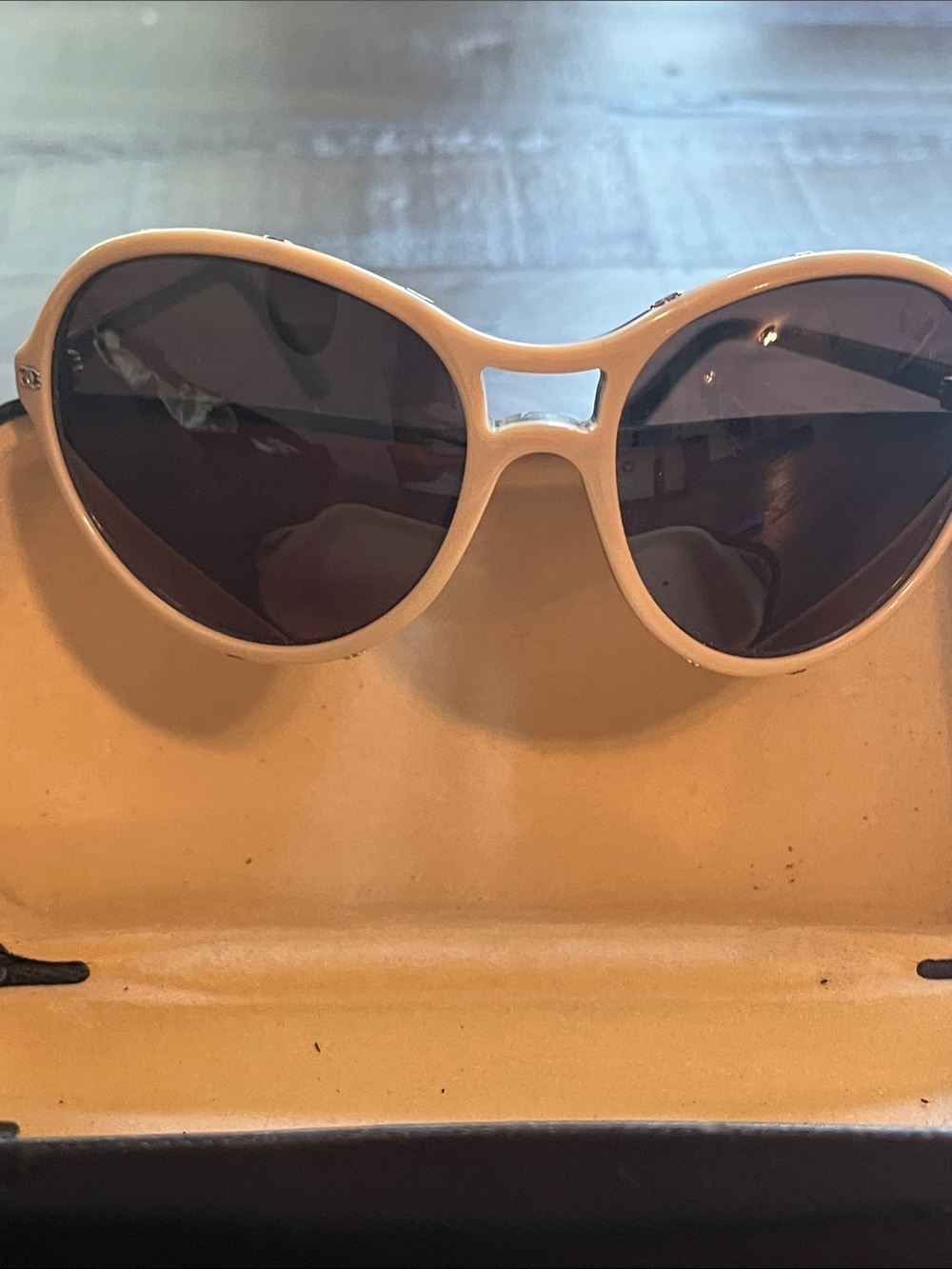 CHANEL Peach Frame Sunglasses with Dark Brown Lenses and Black Temples